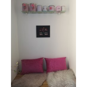 Pandekagehuset i sort ramme