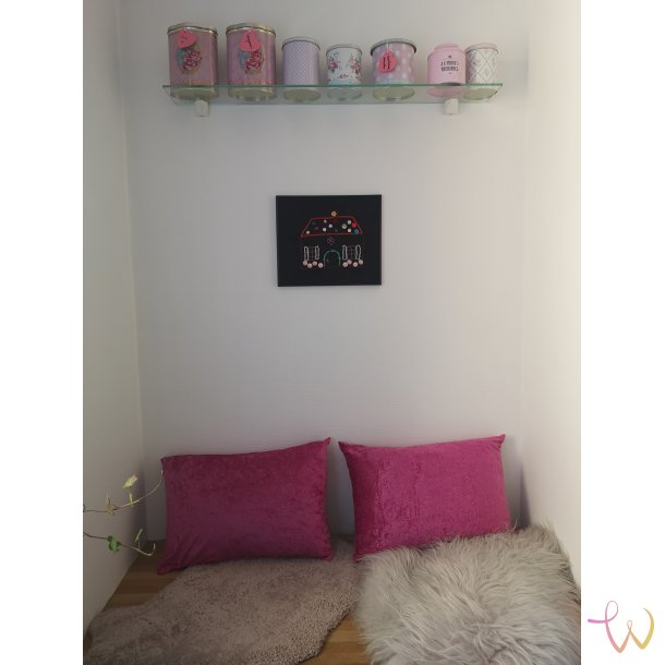 Pandekagehuset i sort ramme