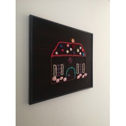 Pandekagehuset i sort ramme