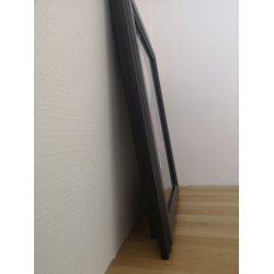 Skipper Trold i sort ramme